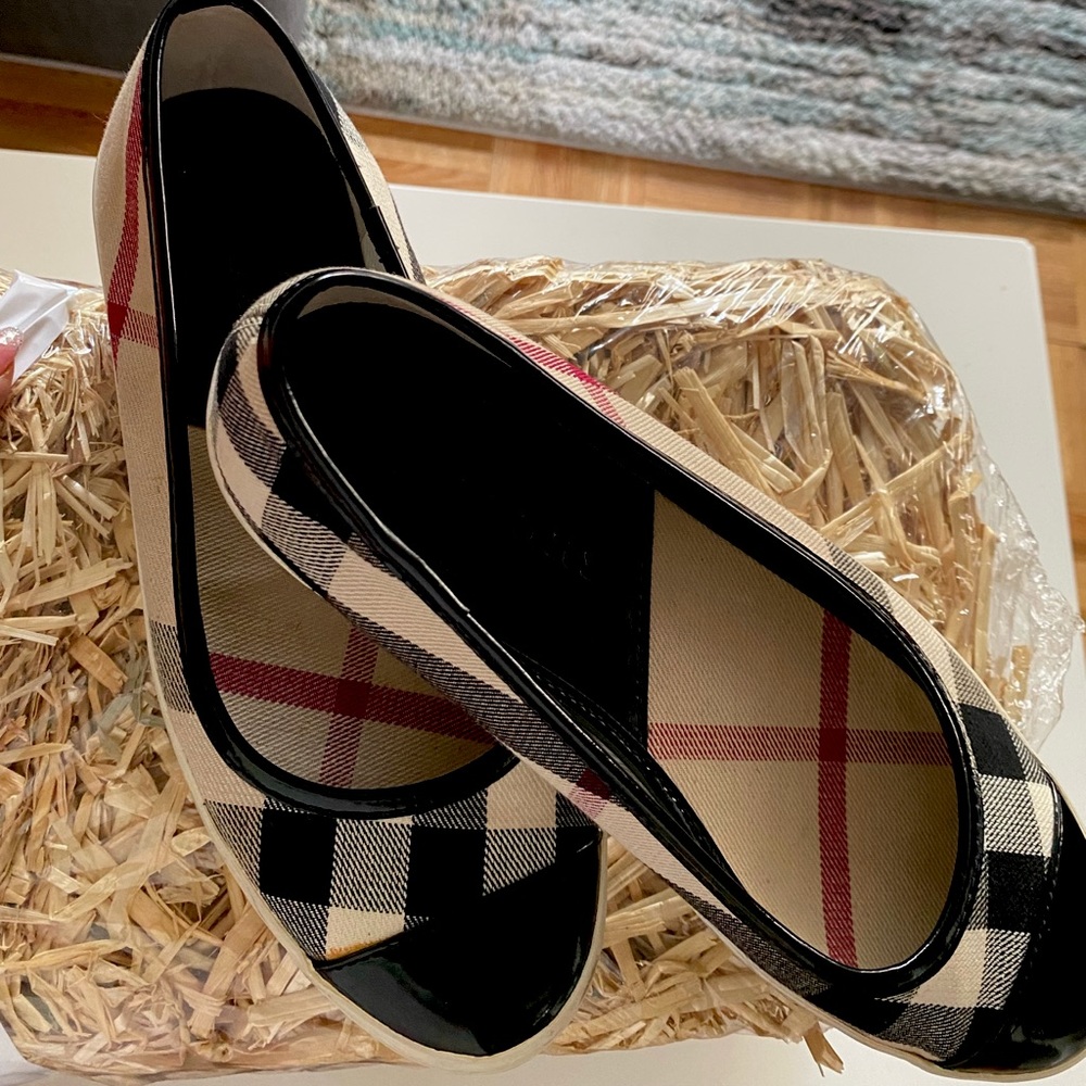 Burberry sneakers size 38. Slightly used. See pics for usage.